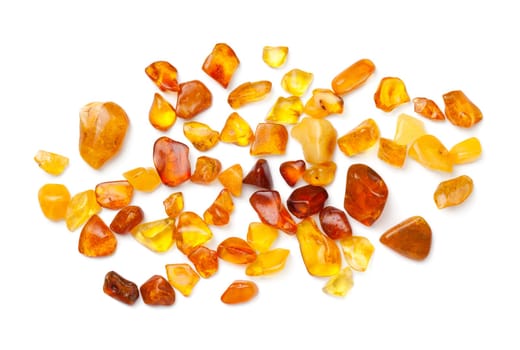 Ambers isolated on white background. Pieces of polished amber. Top view, flat lay