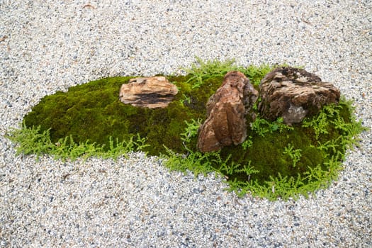 Natural stone landscaping in home garden, stock photo