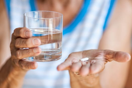 Senior woman taking her daily prescripted medication