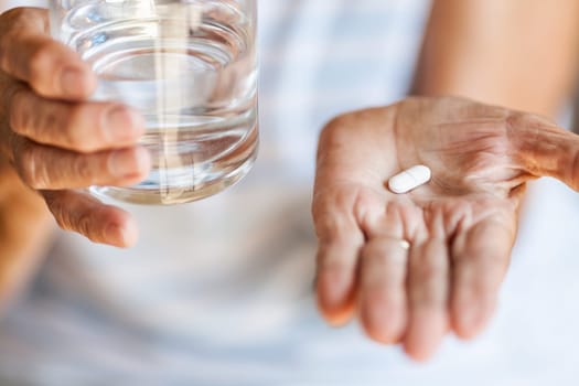 Senior woman taking her daily prescripted medication
