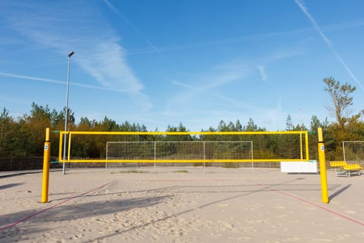 equipped beach volleyball court with spectator seats