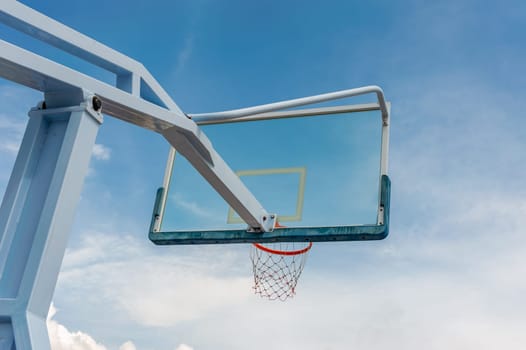 Baskesball court with blue sky and cloud in day light