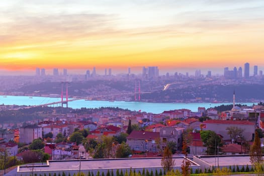 Colors of Istanbul, the Bosphorus bridge and the skyline of the city at sunset.