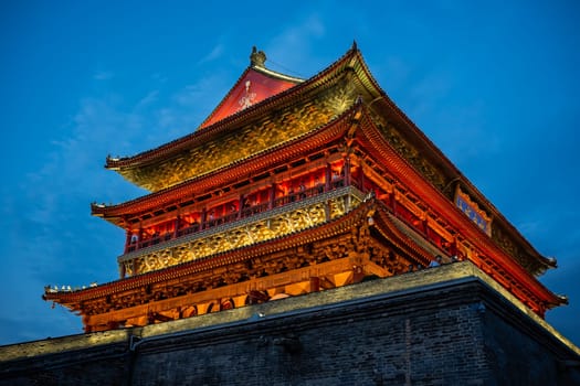 Xian, China -  July 2019 : Xian Bell Drum Tower beautifully lit and illuminated at night, Shaaxi Province