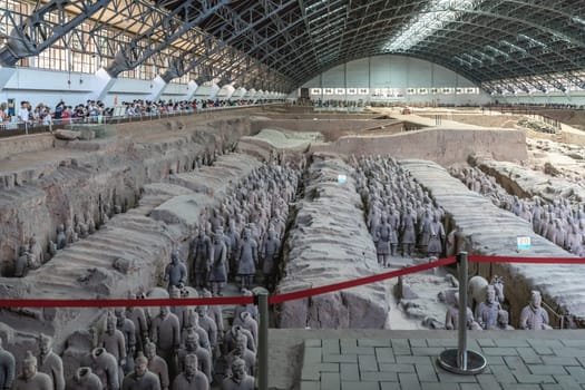 Xian, China -  July 2019 : Terracota Army archeological site, army warrior statues were created during the reign of first chinese emperor Qin Shi Huang Di, Xian, Shaanxi Province
