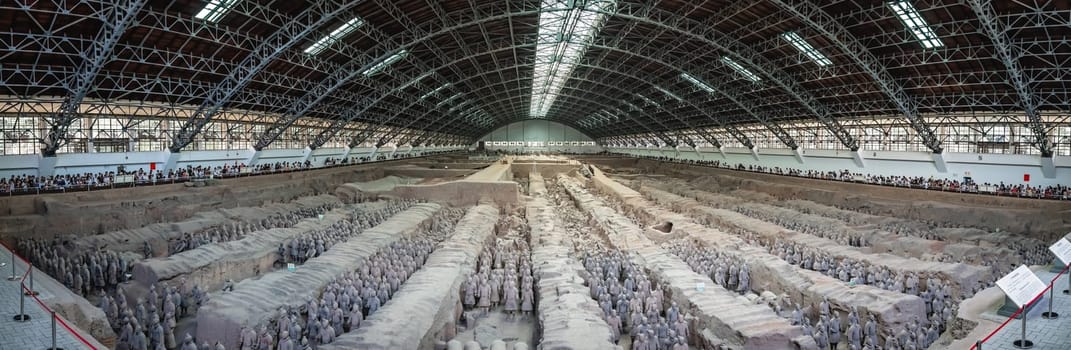 Xian, China -  July 2019 : An army of terracota clay soldiers, created during the reign of first chinese emperor Qin Shi Huang Di, Xian, Shaanxi Province