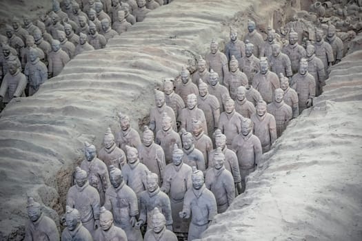 Xian, China -  July 2019 :  Standing clay soldiers forming part of an army of terracota warriors, created during the reign of first chinese emperor Qin Shi Huang Di,Shaanxi Province