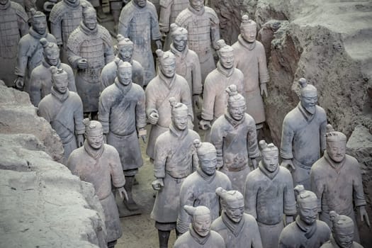 Xian, China -  July 2019 :  Standing clay soldiers forming part of an army of terracota warriors, created during the reign of first chinese emperor Qin Shi Huang Di,Shaanxi Province