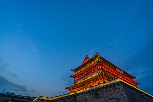 Xian, China -  July 2019 : Bell Drum Tower beautifully lit and illuminated at night, Shaaxi Province, Central China