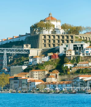 View of old downtown, city Castle and famous Dom Luiz Bridge, Porto, Portugal