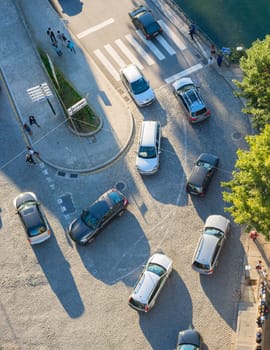 PORTO, PORTUGAL - NOVEMBER 13, 2016: Top view of cars traffic on an Old Town paved road in a morning light
