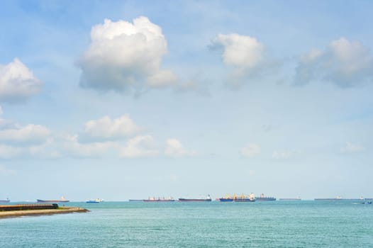 Industrial cargo shipping tankers in Singapore harbor