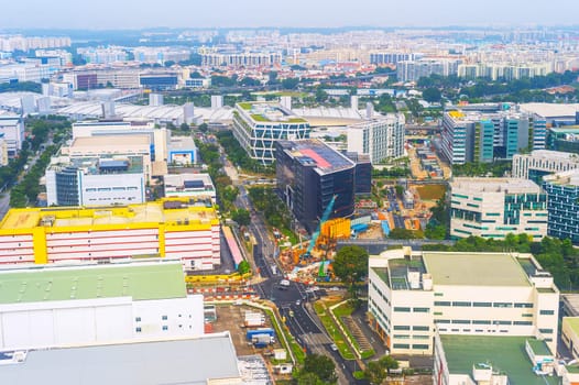 Aerial view of Singapore. Road, business centers, construction site