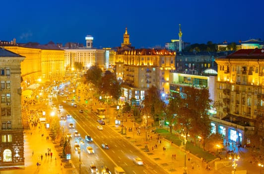 Twilight view of Kiev cityscape with illuminated Khreshatyk street in downtown aerial view, Ukraine