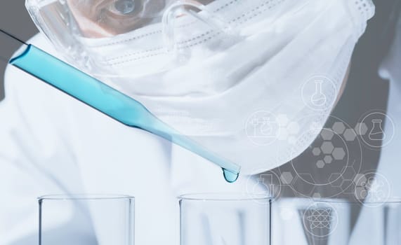 Researcher with glass laboratory chemical test tubes with liquid for analytical , medical, pharmaceutical and scientific research concept.