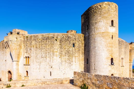 Beautiful old Castell de Bellver, blue sky without clouds, Palma de Mallorca, Spain
