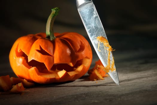 Carving a Halloween jack o' lantern