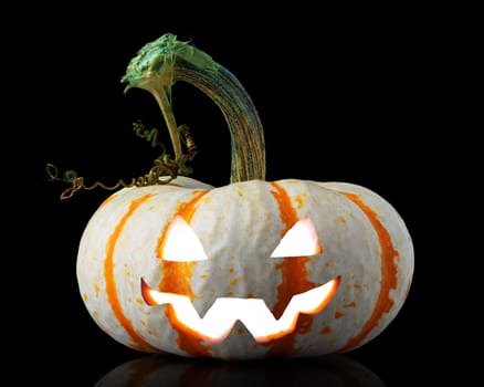 Single orange striped pumpkin jack-o-lantern isolated on black