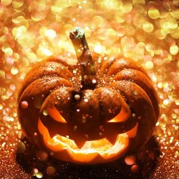 Glowing Jack-o-Lantern on sparkly orange background