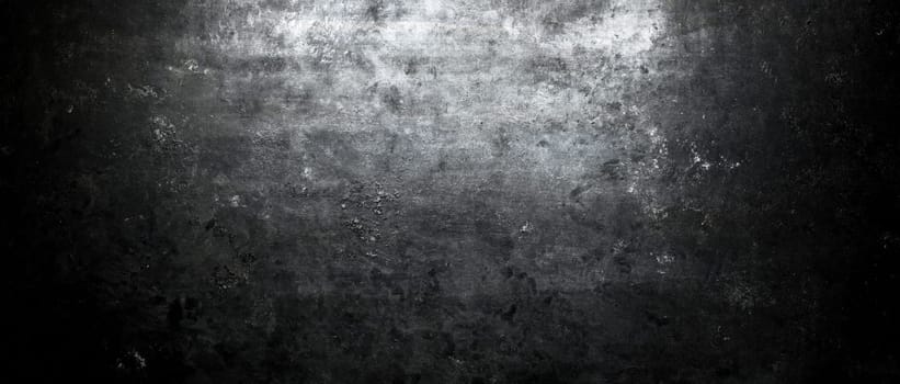 Rough, dark stone wall lit from above by spotlight. Grunge background
