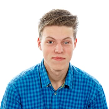 A teenage boy waring a blue shirt