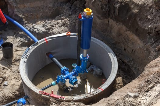 The construction of a municipal water supply tap being built