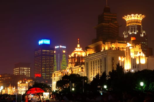 The night view of Shanghai Bund, where the commerical buildings are of vintage structure.