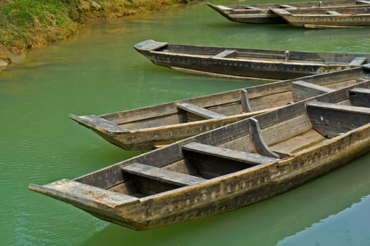 The anchored boats on a river of city park