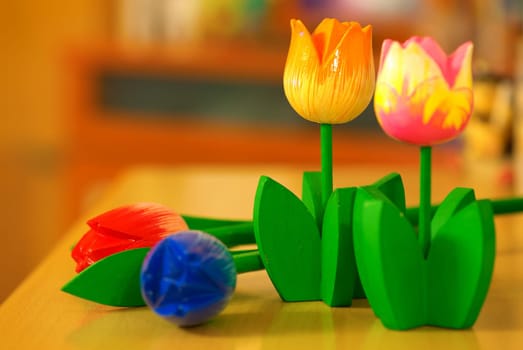 The wooden statue of (yellow) tulips flowers