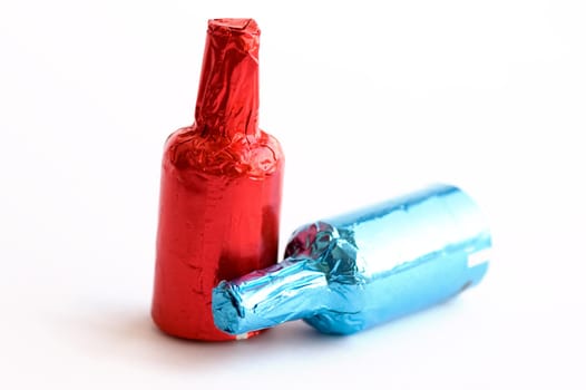 Close up view of colorful chocolate bottles