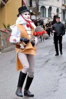 Orani, Sardinia, Italy - February 15, 2015: Parade of traditional masks of Sardinia during the Carnival 2015 in Orani.