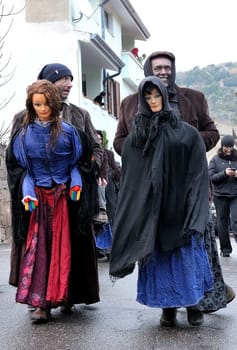 Orani, Sardinia, Italy - February 15, 2015: Parade of traditional masks of Sardinia during the Carnival 2015 in Orani.