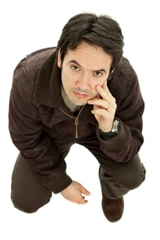 young casual man looking up, isolated on white