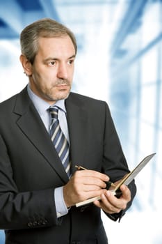 pensive mature business man at the office
