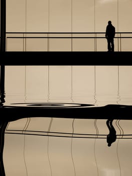 man in the modern building, with reflection