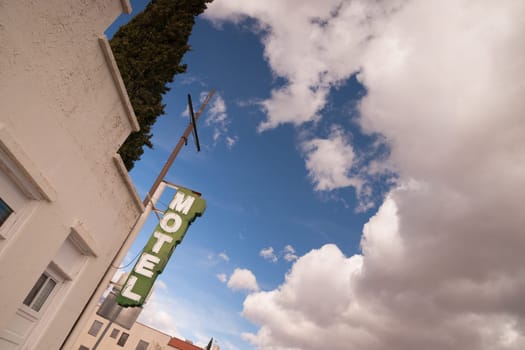 It's a clear blue sky day on main street in this one motel town