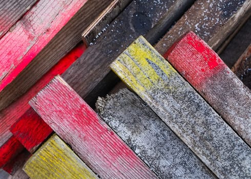 Colorfully painted wooden stoecke