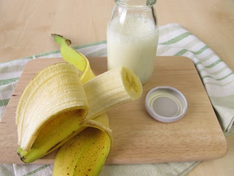 A bottle of kefir with banana