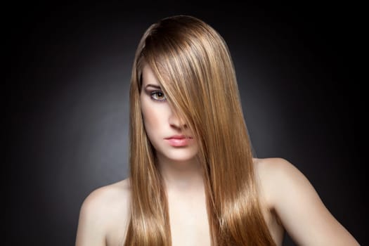 Woman with long straight and shiny hair