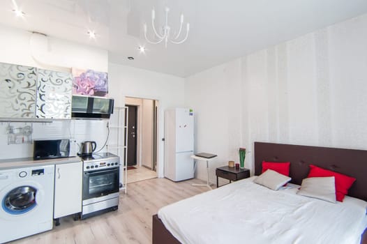 Russia, Moscow- May 07, 2018: interior room apartment. standard repair decoration in hostel. kitchen and dining room