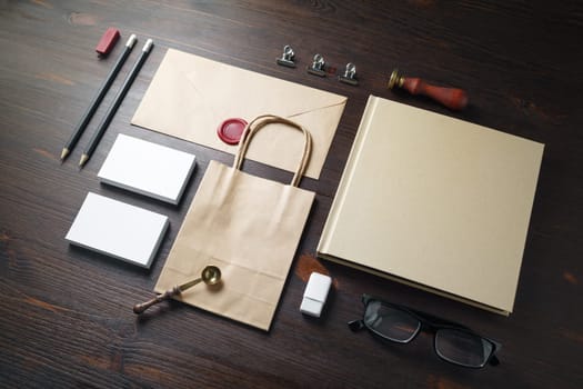 Stationery mock up. Blank corporate identity template on wooden background. Responsive design mockup.