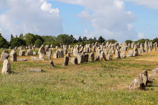 Alignements de Kermario, rows of standing stones - Menhirs, the largest megalithic site in the world, Carnac, Brittany, France.