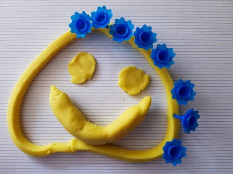 Fanny face made of a modeling clay. Made by child.