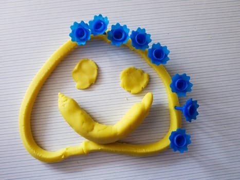 Fanny face made of a modeling clay. Made by child.