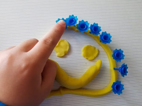 Fanny face made of a modeling clay. Made by child.