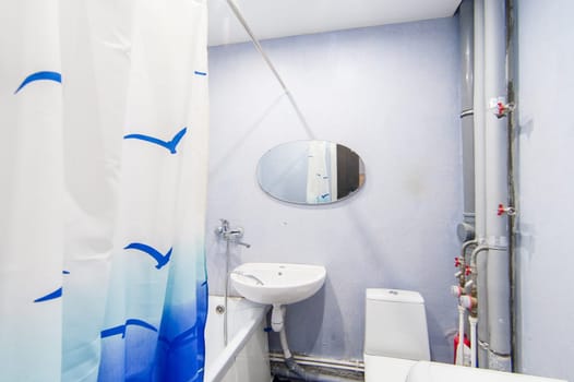 Russia, Moscow- May 12, 2018: interior room apartment. standard repair decoration in hostel. bathroom and toilet