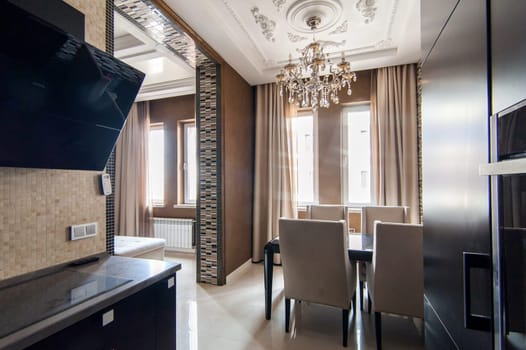 Russia, Moscow- May 12, 2018: interior room apartment. standard repair decoration in hostel. kitchen and dining room