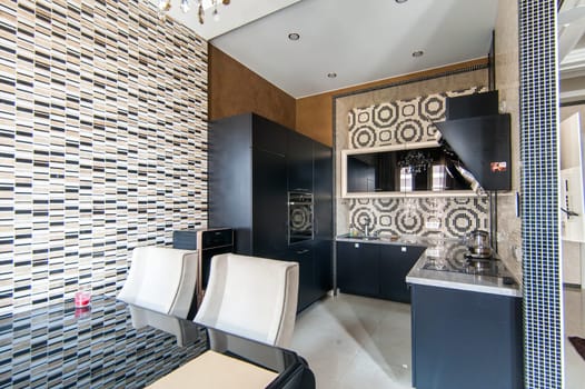 Russia, Moscow- May 12, 2018: interior room apartment. standard repair decoration in hostel. kitchen and dining room