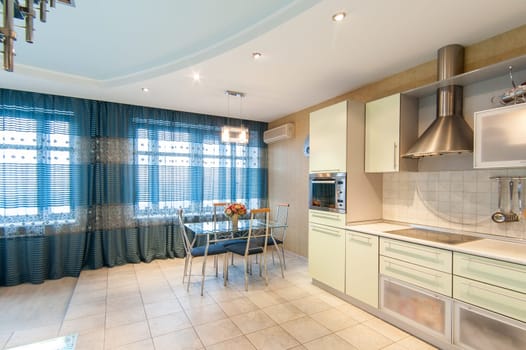 Russia, Moscow- May 12, 2018: interior room apartment. standard repair decoration in hostel. kitchen and dining room