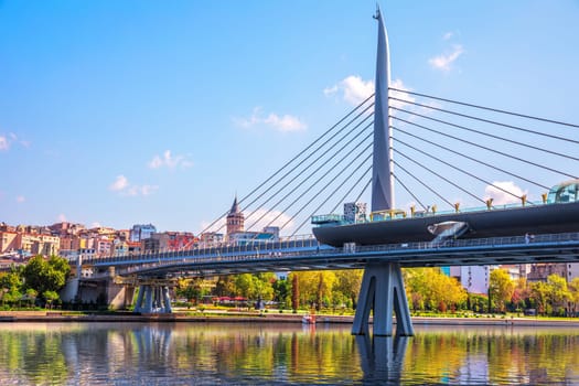 Halic Bridge over the Golden Horn and the Galata Tower, Istanbul, Turkey.